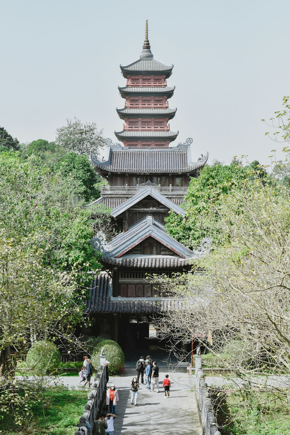 a tall building with a tower in the middle of it