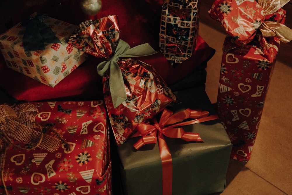 a pile of wrapped presents sitting next to each other