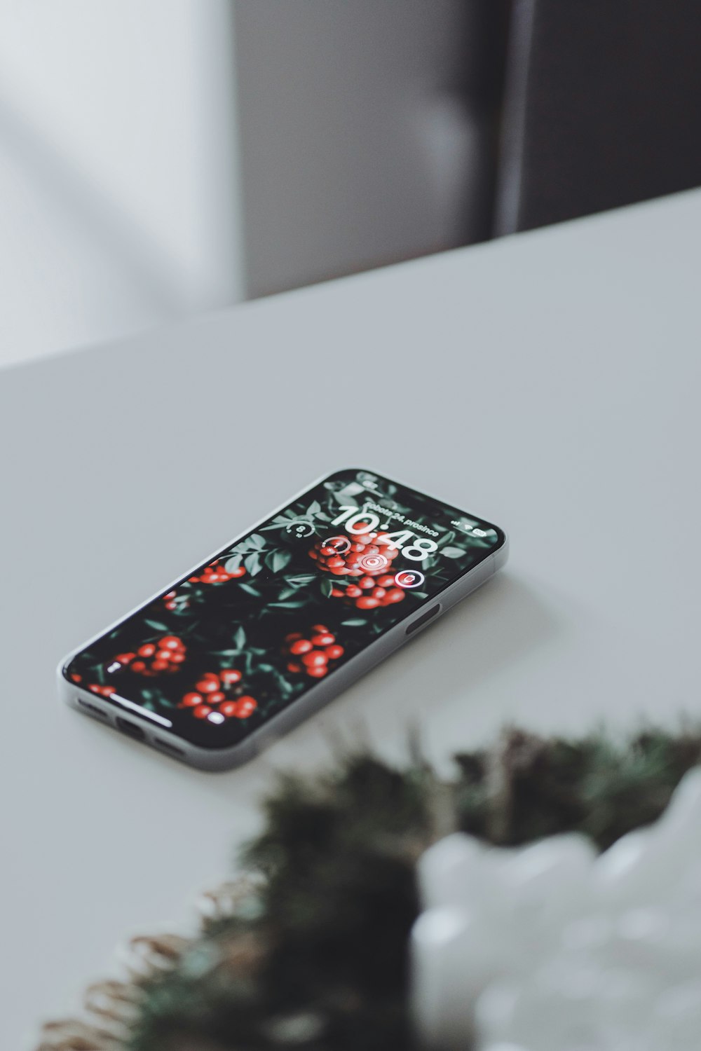 a cell phone sitting on top of a white table