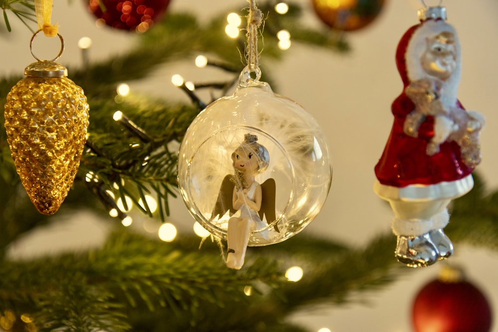 a christmas ornament hanging from a christmas tree