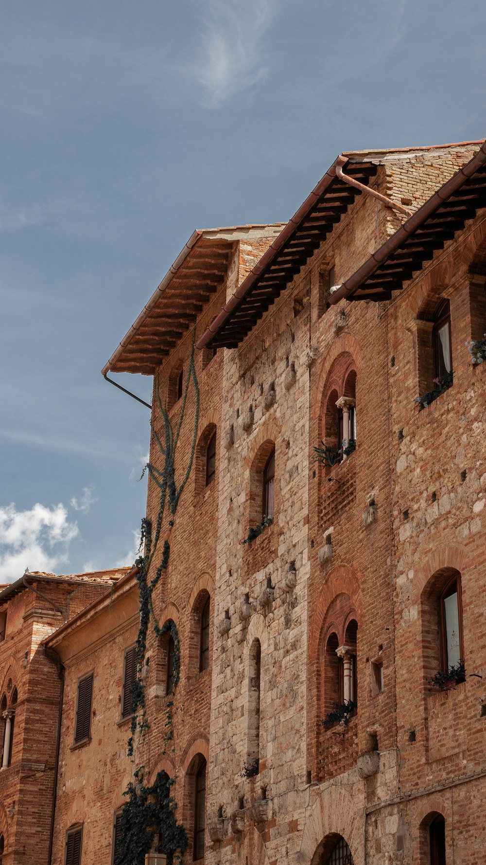 a large brick building with lots of windows