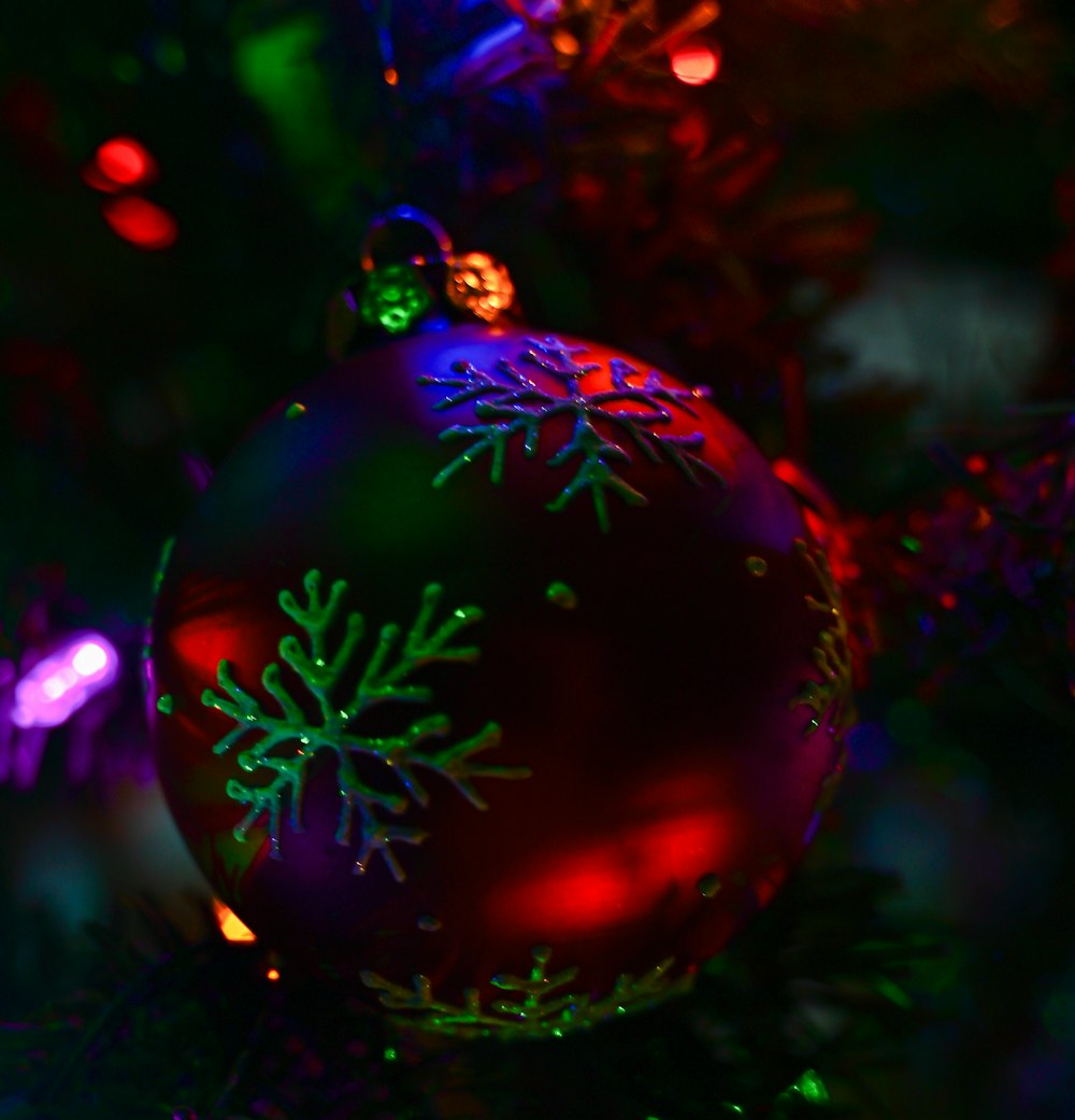 a close up of a christmas ornament on a tree