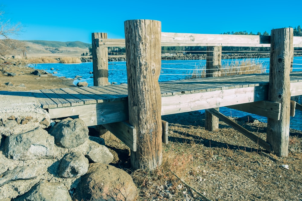 a wooden bridge over a body of water