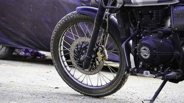 Close-up of high-performance motocross suspension parts with a dark, sleek background.