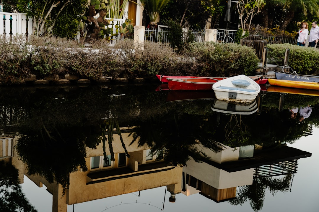 a couple of boats that are sitting in the water,