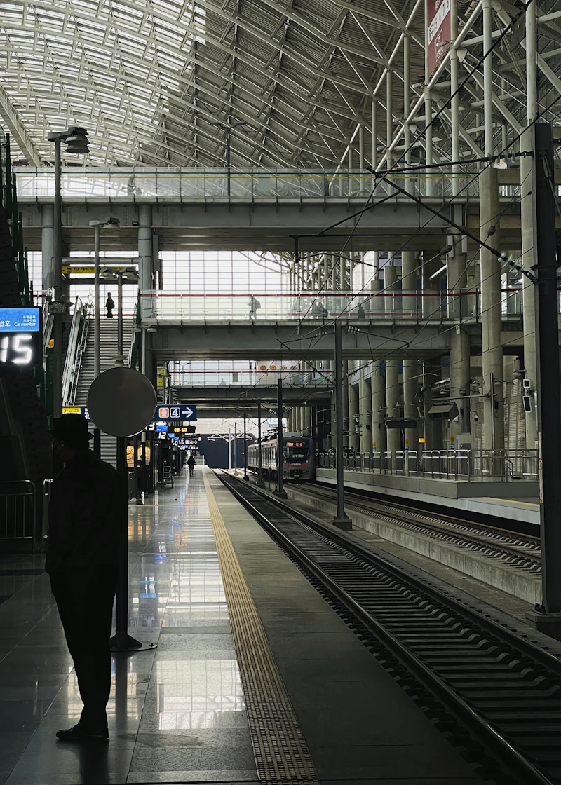Korea KTX train station platform with high-speed train
