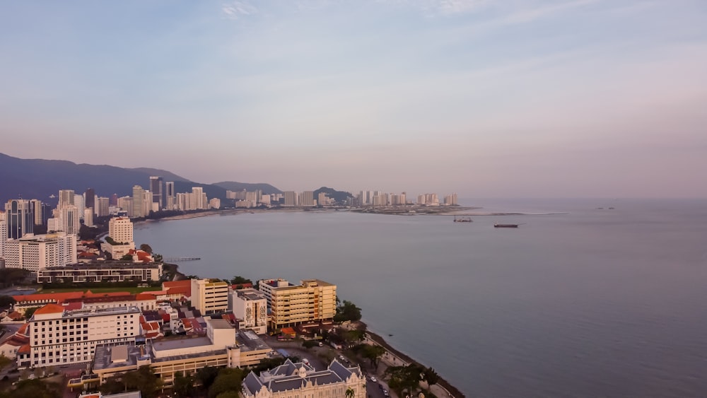 a large body of water surrounded by tall buildings