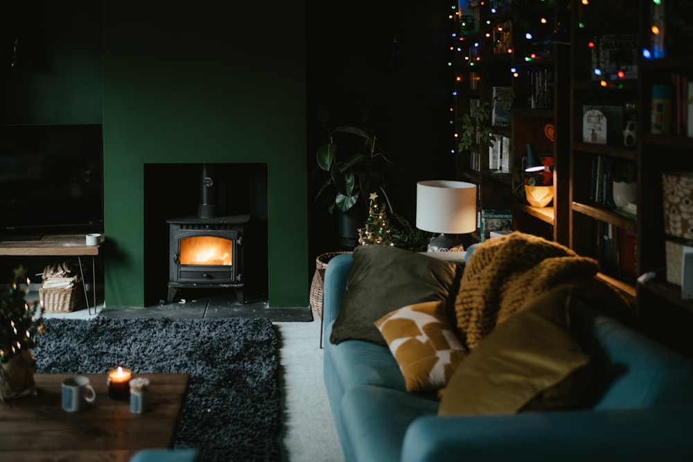 a living room filled with furniture and a fire place