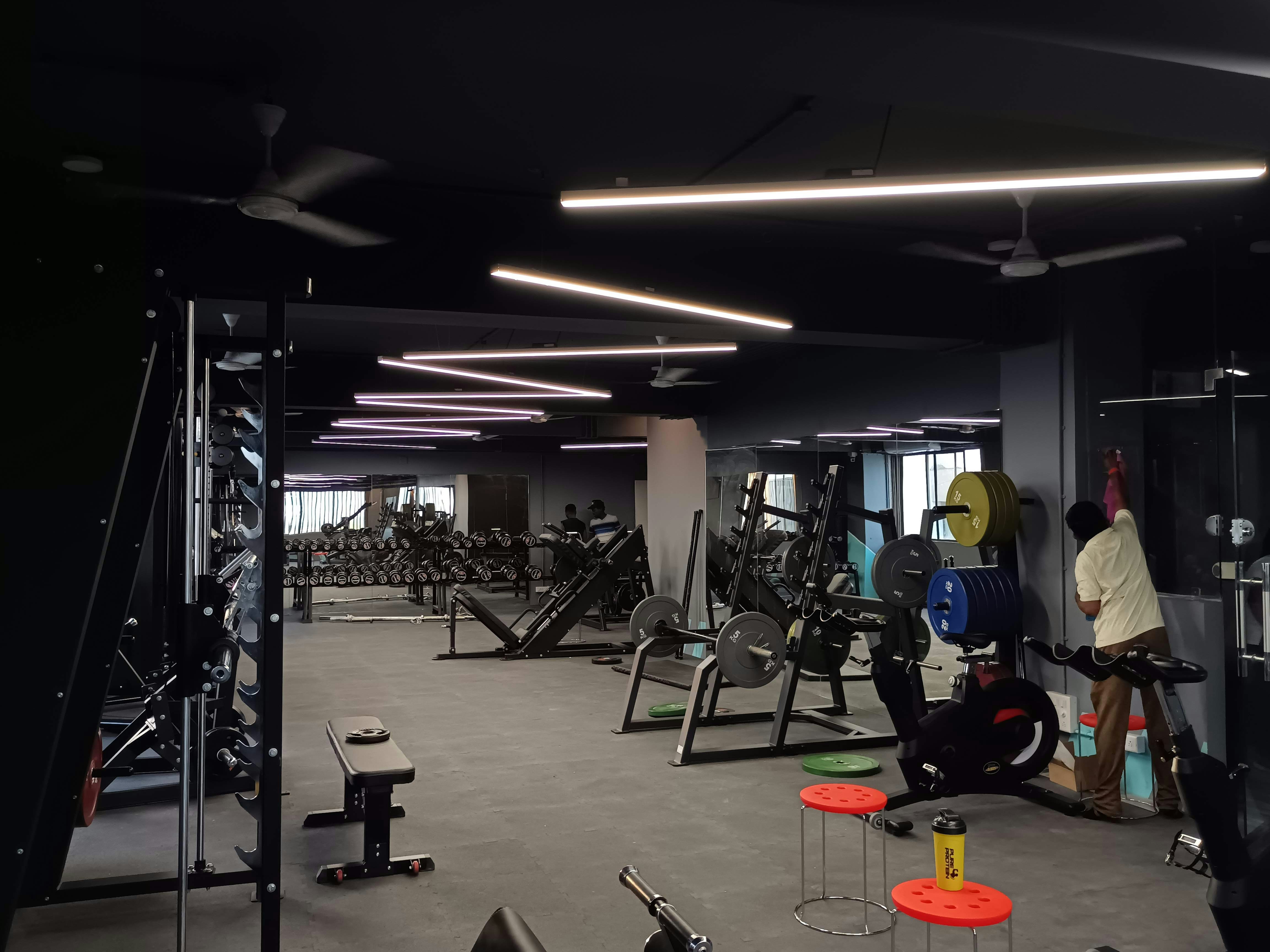 a gym filled with lots of exercise equipment