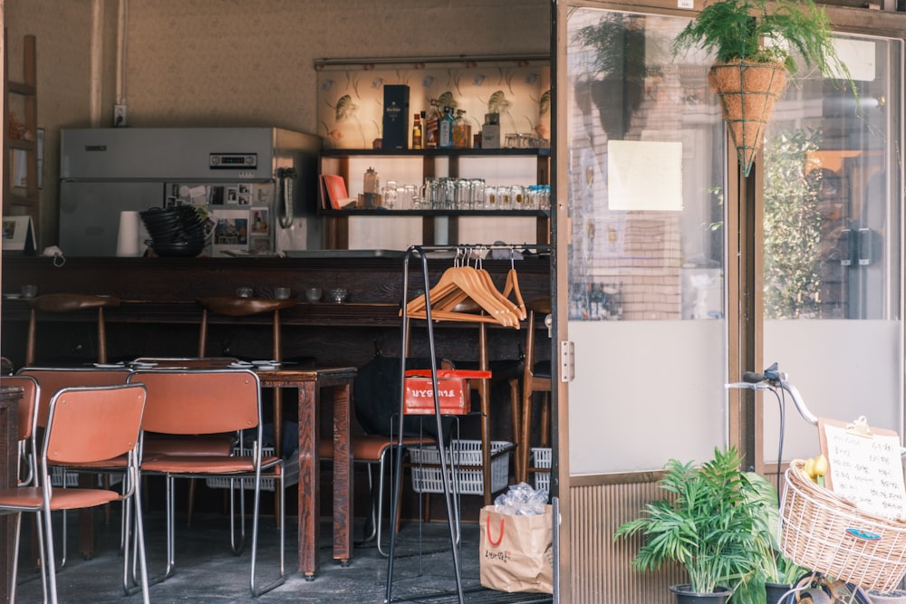 a room with a bunch of chairs and a table