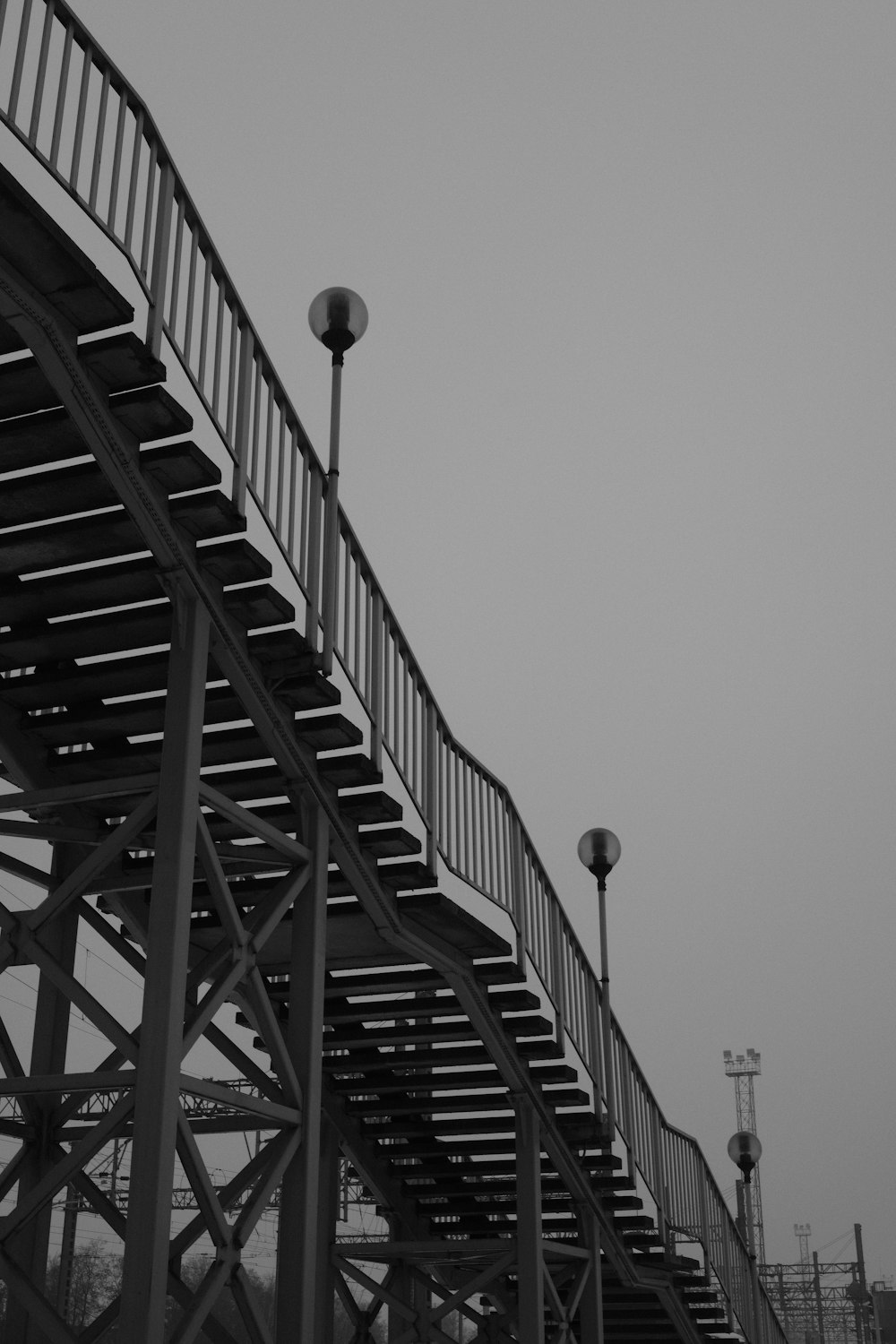 a black and white photo of a stairway