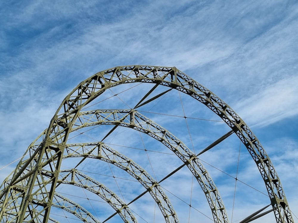 a roller coaster going through the air on a sunny day