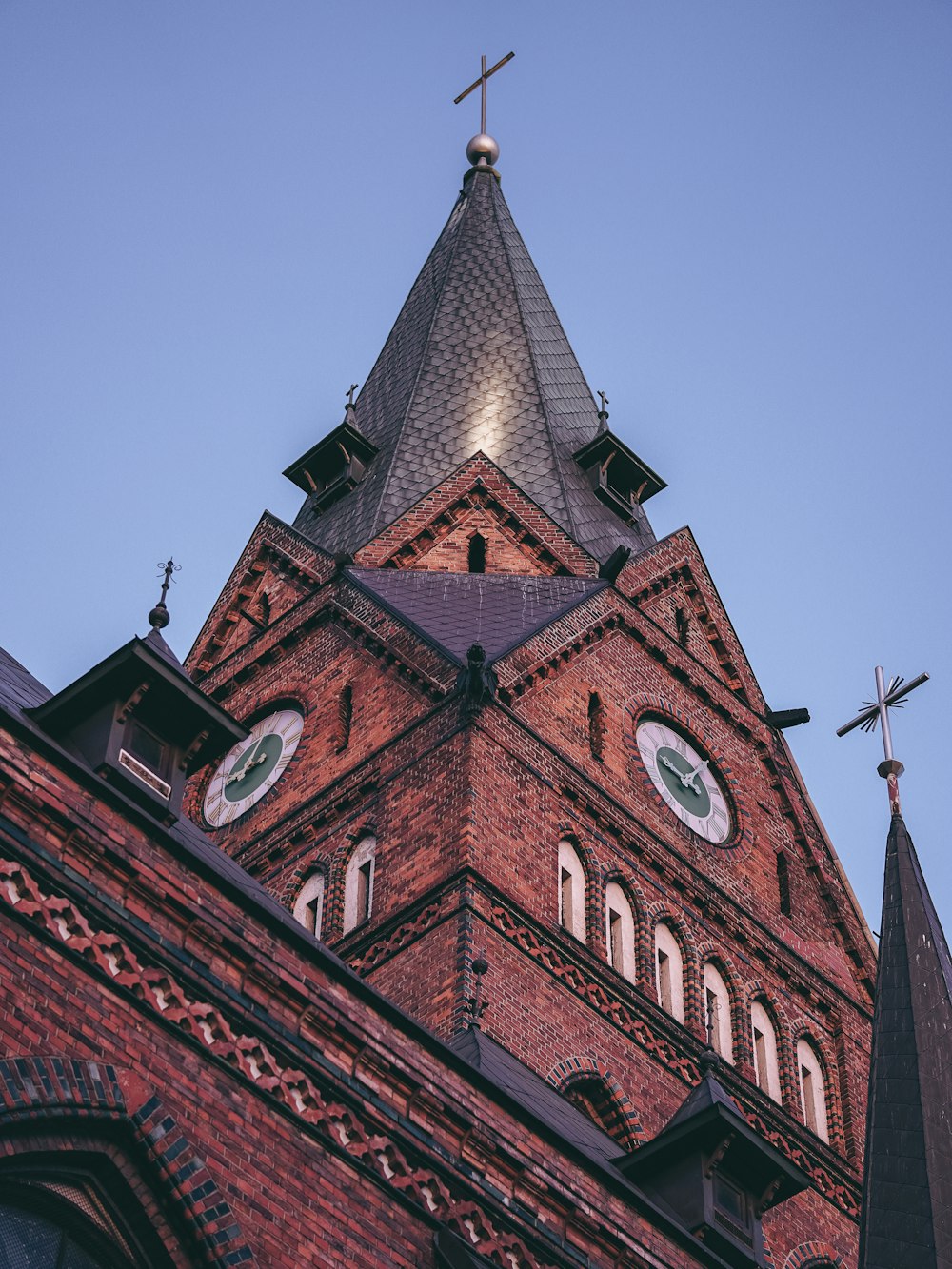 a church steeple with a clock on it