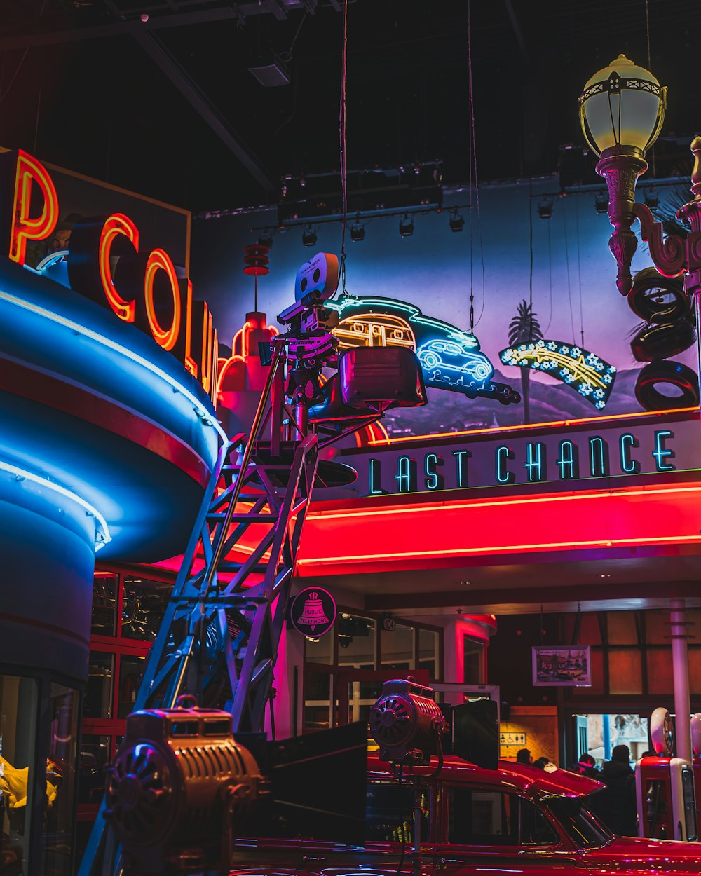 a neon sign is lit up in the dark