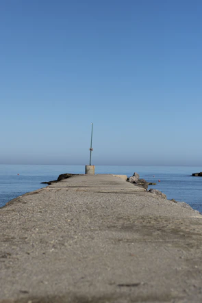 Pier cap installed on a wooden post outdoors.