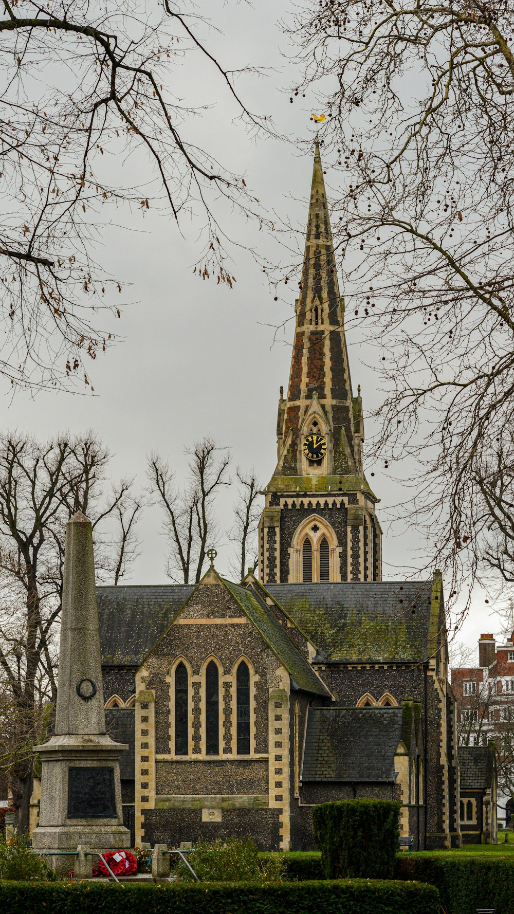 a church with a steeple and a bell tower