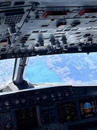 A high-res image of a pilot wearing waterproof boots in an aircraft.