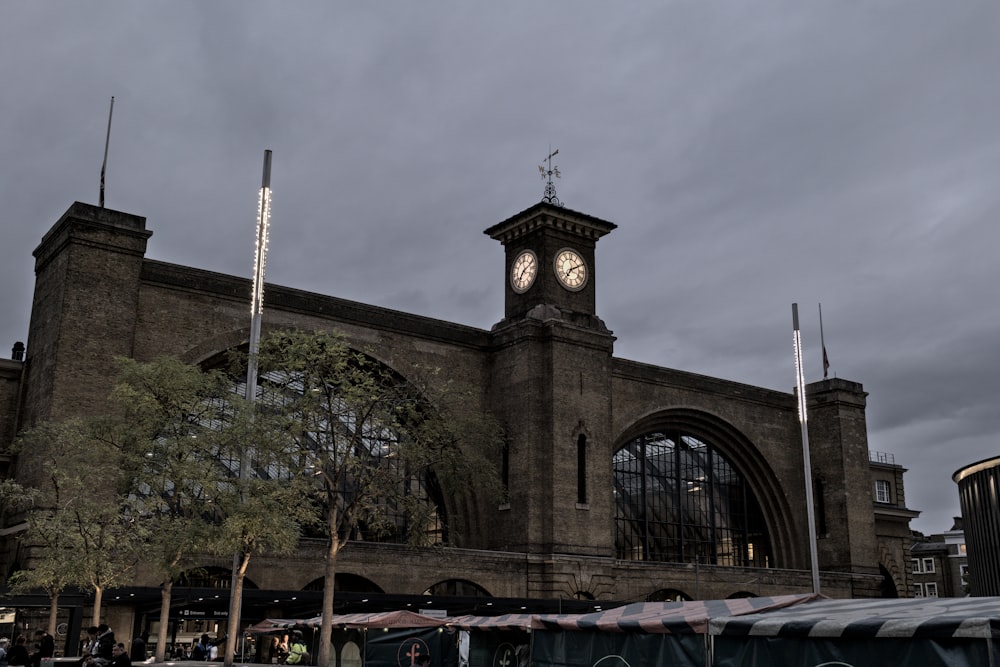 a large building with a clock on the top of it