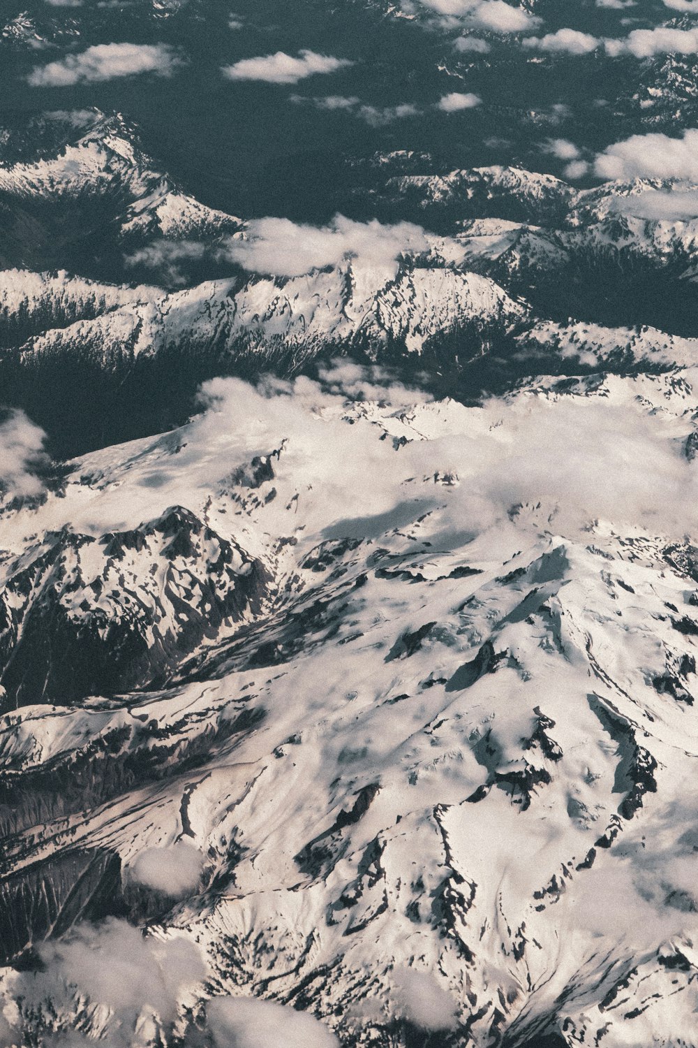 a view of a mountain range from an airplane