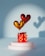 A red gift box with yellow polka dots sits on a white pedestal. Above the box are two heart-shaped balloons, one gold and one red, casting distinct shadows on a blue background.