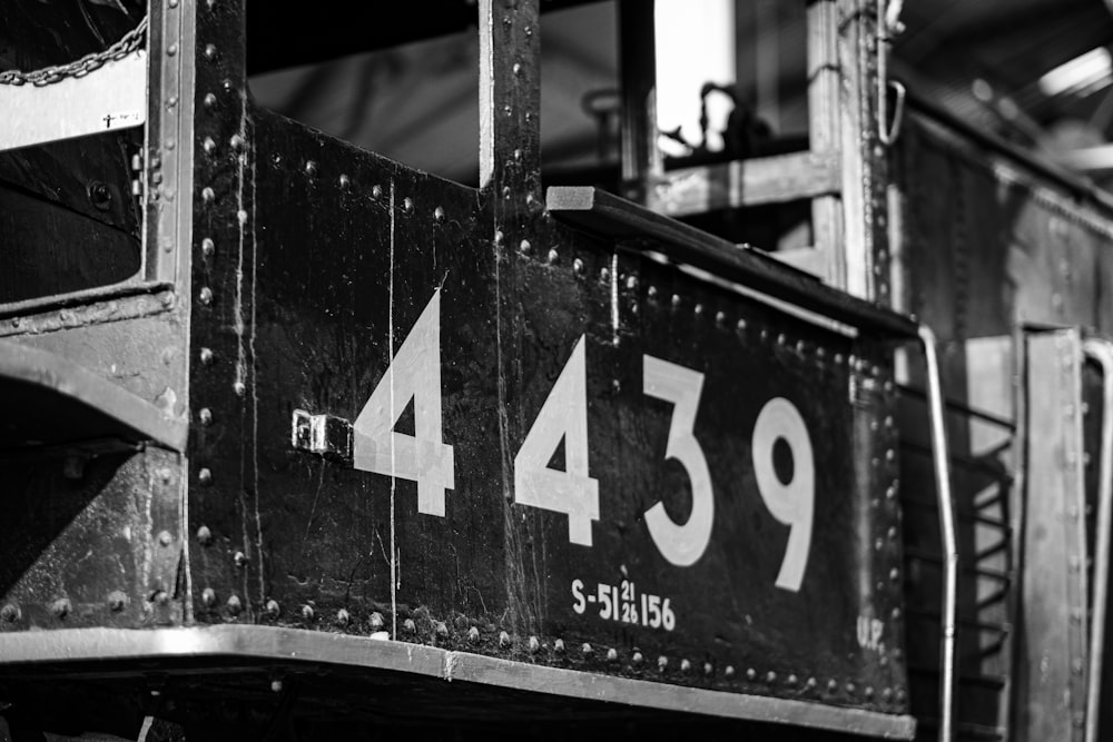 a black and white photo of a train