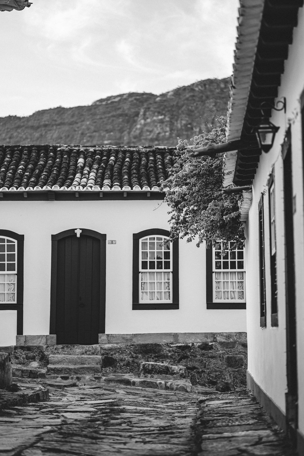 a black and white photo of a house