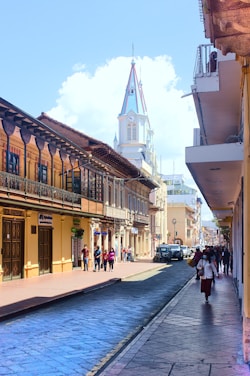 A vibrant street scene in Cartagena showcasing colorful colonial buildings.