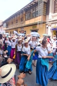 A vibrant community event showcasing women participating in activities.