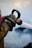 A close-up of a pressure washer in action, spraying water on a dirty surface.