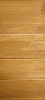 Several horizontal wooden planks with a smooth finish and natural grain patterns.
