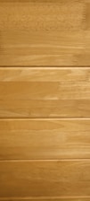 Several horizontal wooden planks with a smooth finish and natural grain patterns.