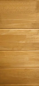 Several horizontal wooden planks with a smooth finish and natural grain patterns.