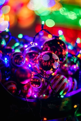 A collection of festive holiday décor items in vibrant colors.