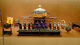 Close-up of traditional Chinese crafts displayed at a jubileo exhibition.
