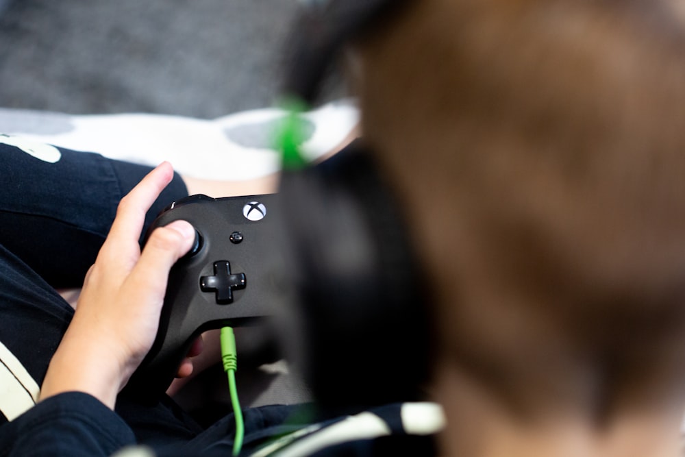 a close up of a person playing a video game