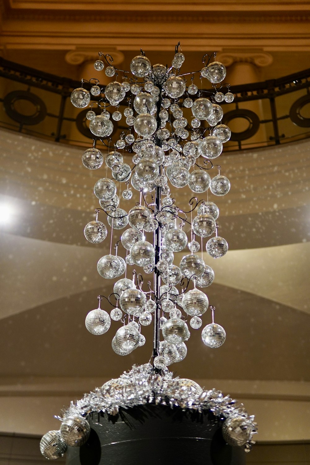 a chandelier hanging from the ceiling of a building