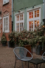 An outdoor space with seating and decorative elements.