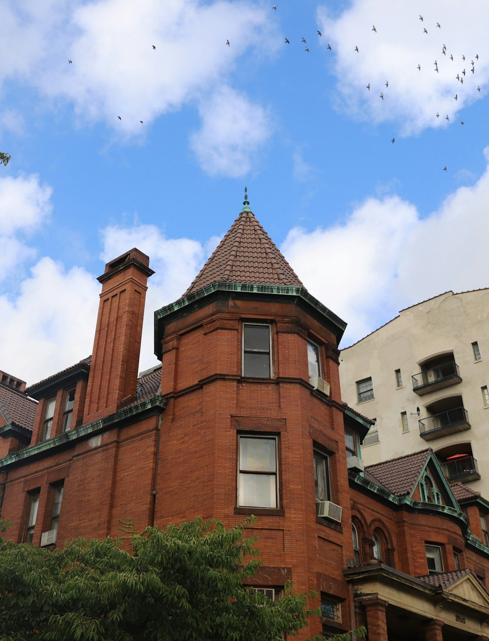 a red brick building with a clock tower