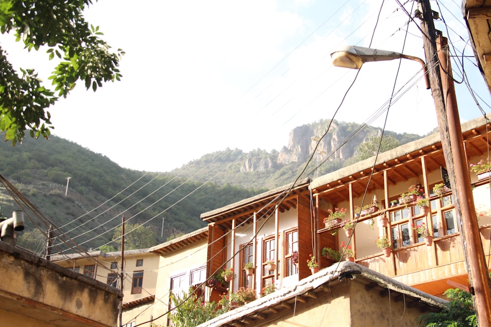 a view of a building with a mountain in the background