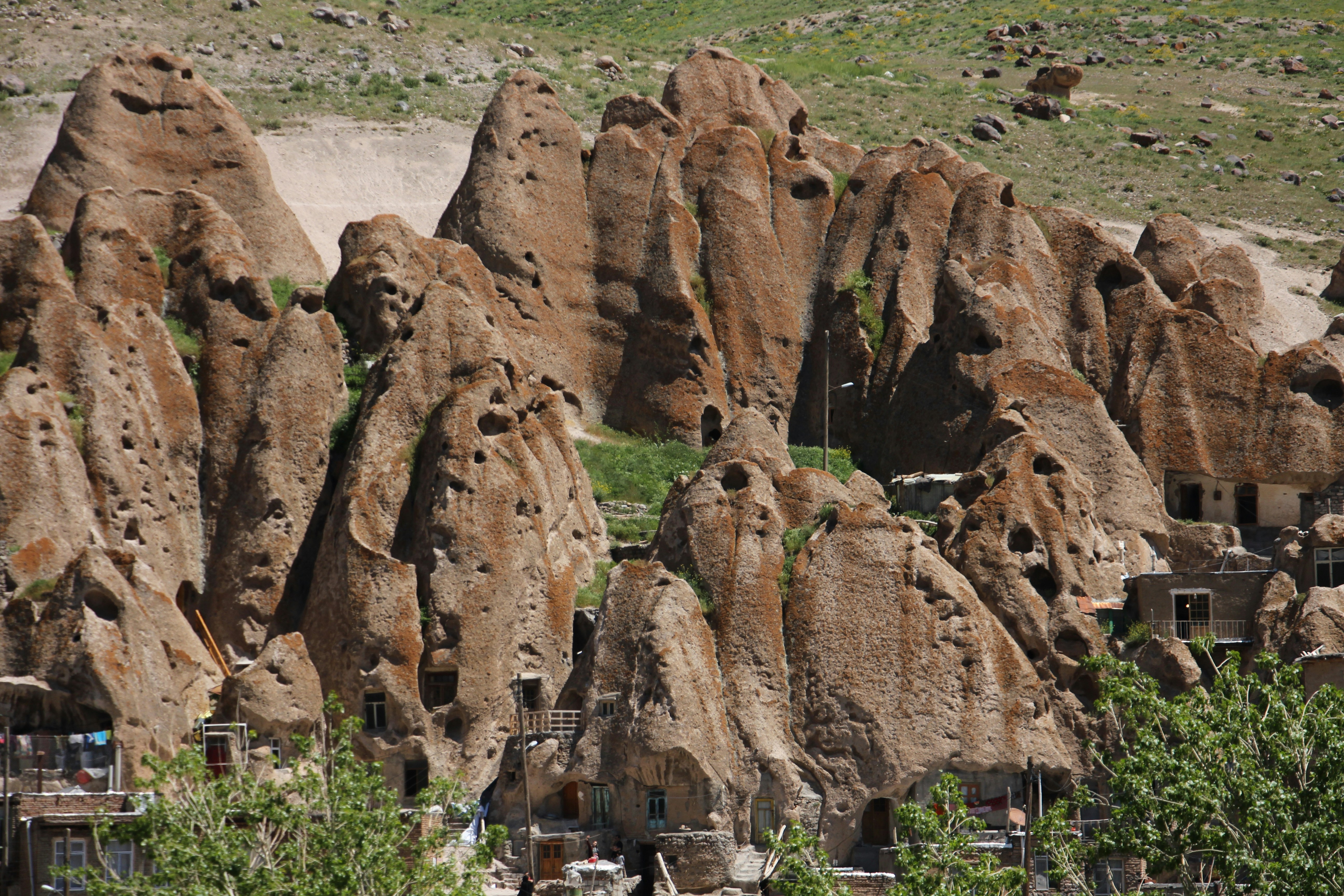 A group of large rocks sitting next to each other photo – Free Kandovan ...
