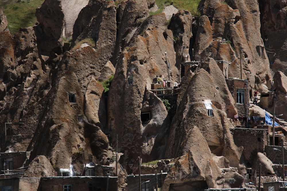 a group of people standing on top of a mountain