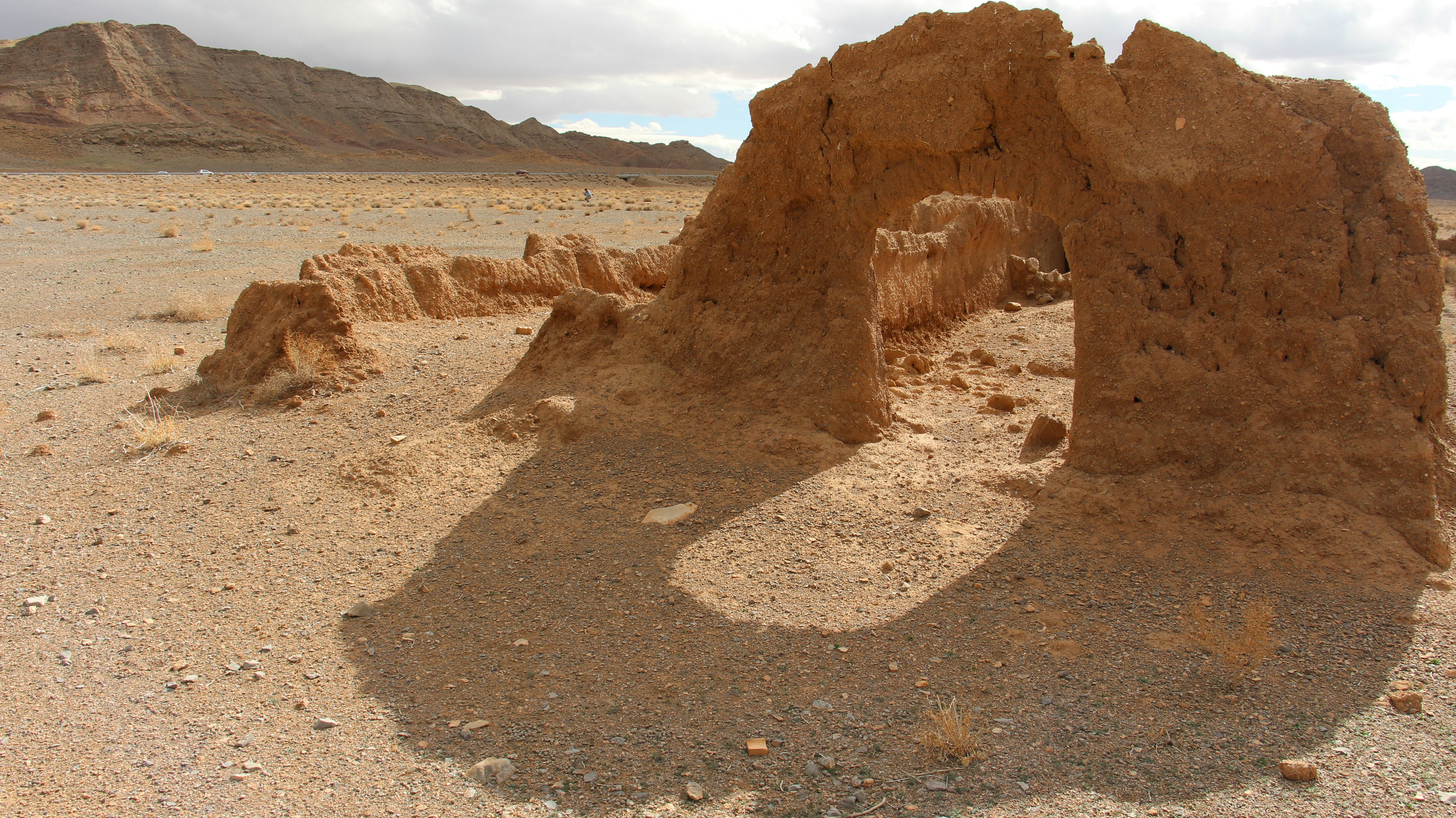 a rock formation in the middle of a desert
