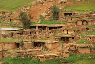 a group of houses built into the side of a hill