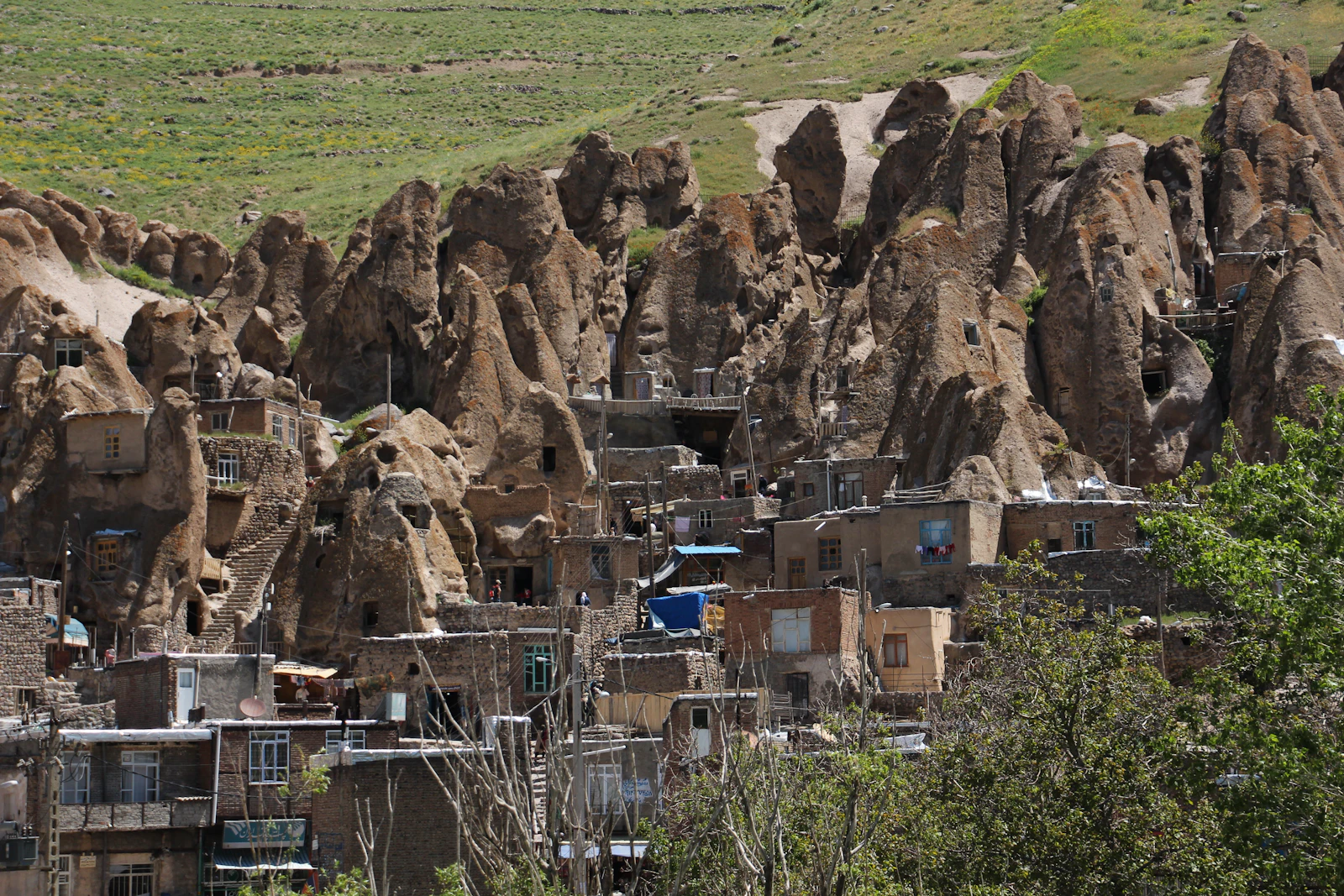 Houses carved into the volcanic cones — Kandovan, Iran