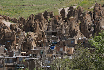 Houses carved into the volcanic cones — Kandovan, Iran