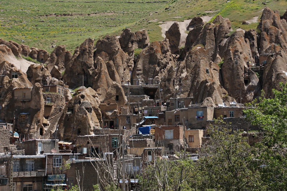 a group of buildings built into the side of a mountain