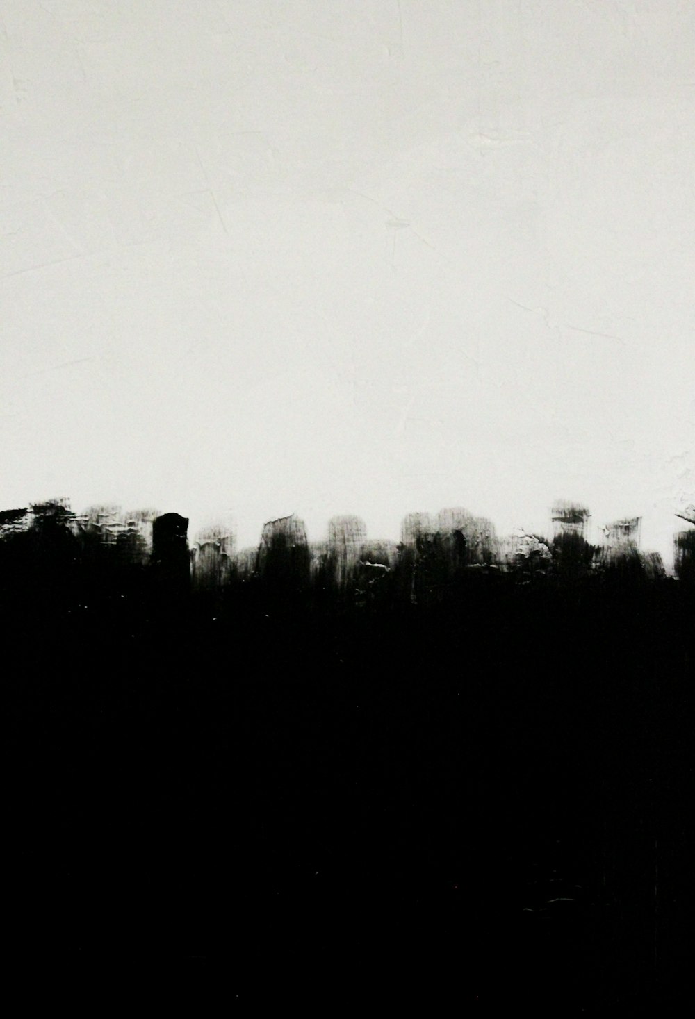 a black and white photo of a city skyline