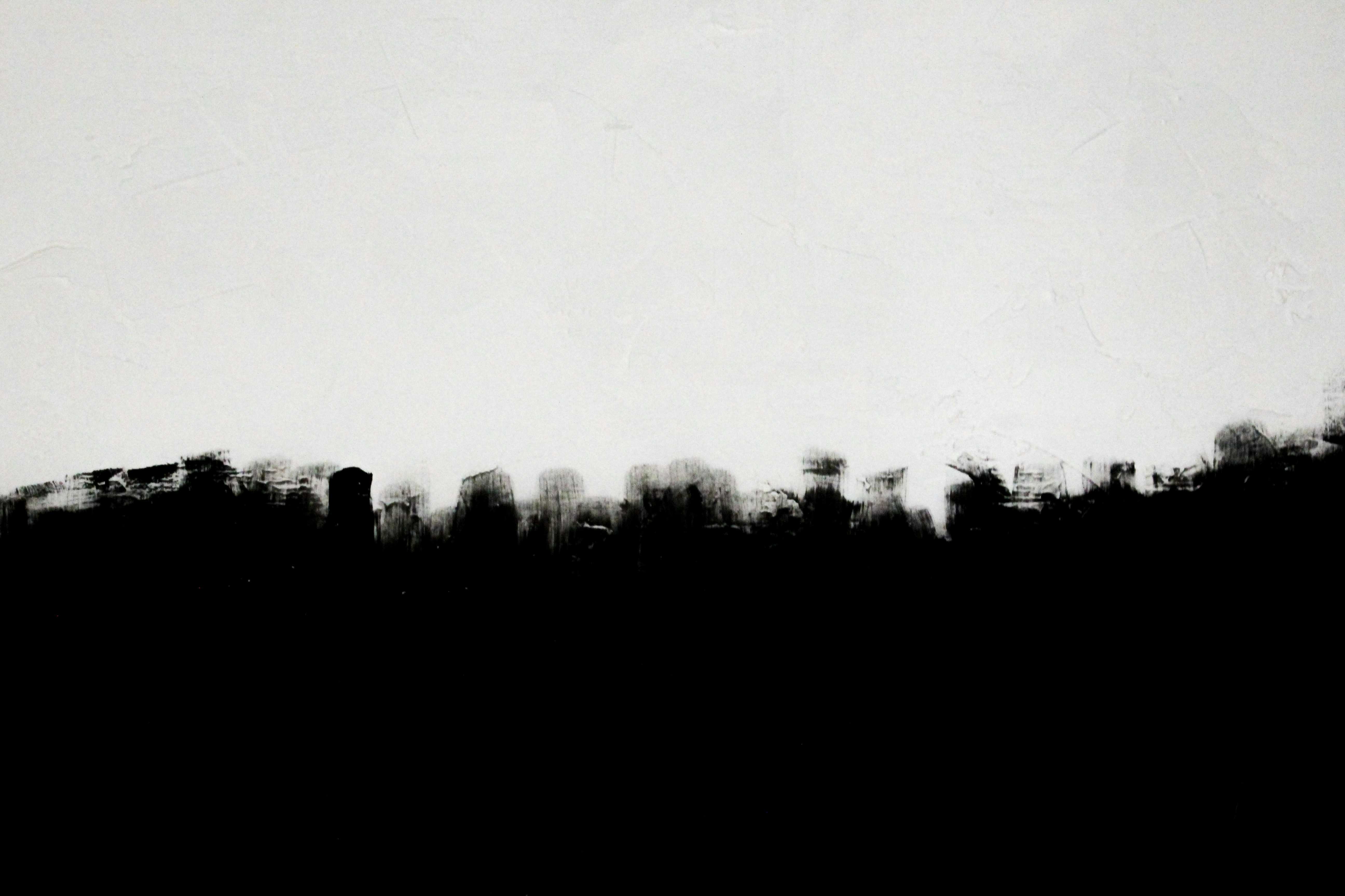 a black and white photo of a city skyline