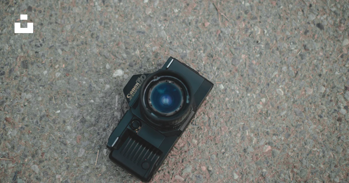 An overhead view of a camera on the ground photo – Free Camera Image on ...