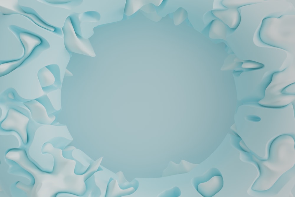 a blue and white background with a circular hole in the center